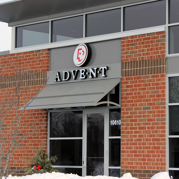 Front entrance and sign for the Avent Health building, a Tri-North Builders project in Mequon, WI.