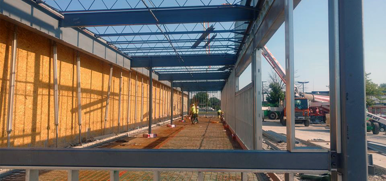 Members of the Tri-North construction team make progress on a new ALDI grocery store.