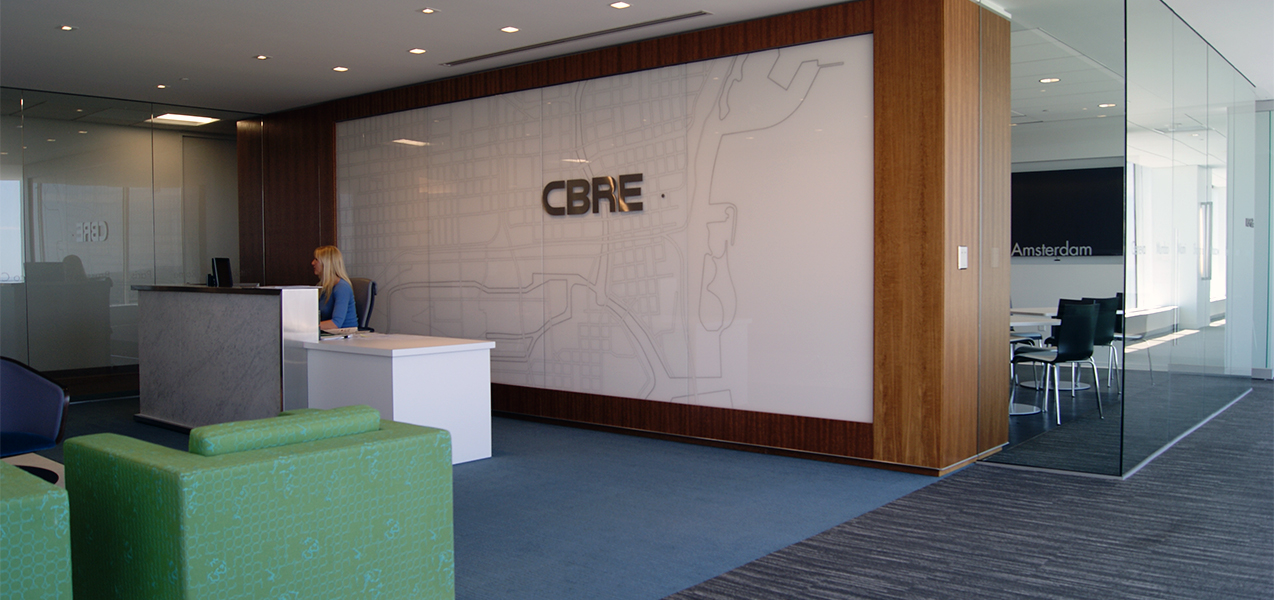 Receptionist area and waiting room inside the CBRE building in Milwaukee, WI, a Tri-North Builders project.