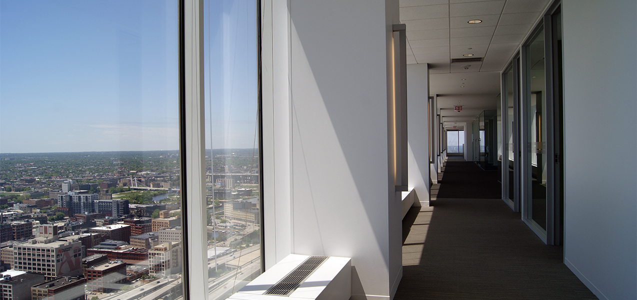 Hallway with windows overlooking Milwaukee, WI, at the Tri-North Builders project for the CBRE building.