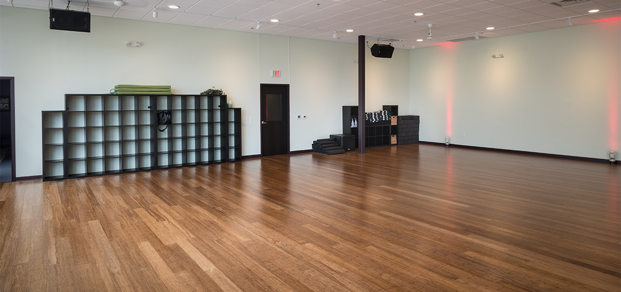 Open space with hardwood floors for events at the Galaxie Condominiums in Madison, WI, a Tri-North Builder project.