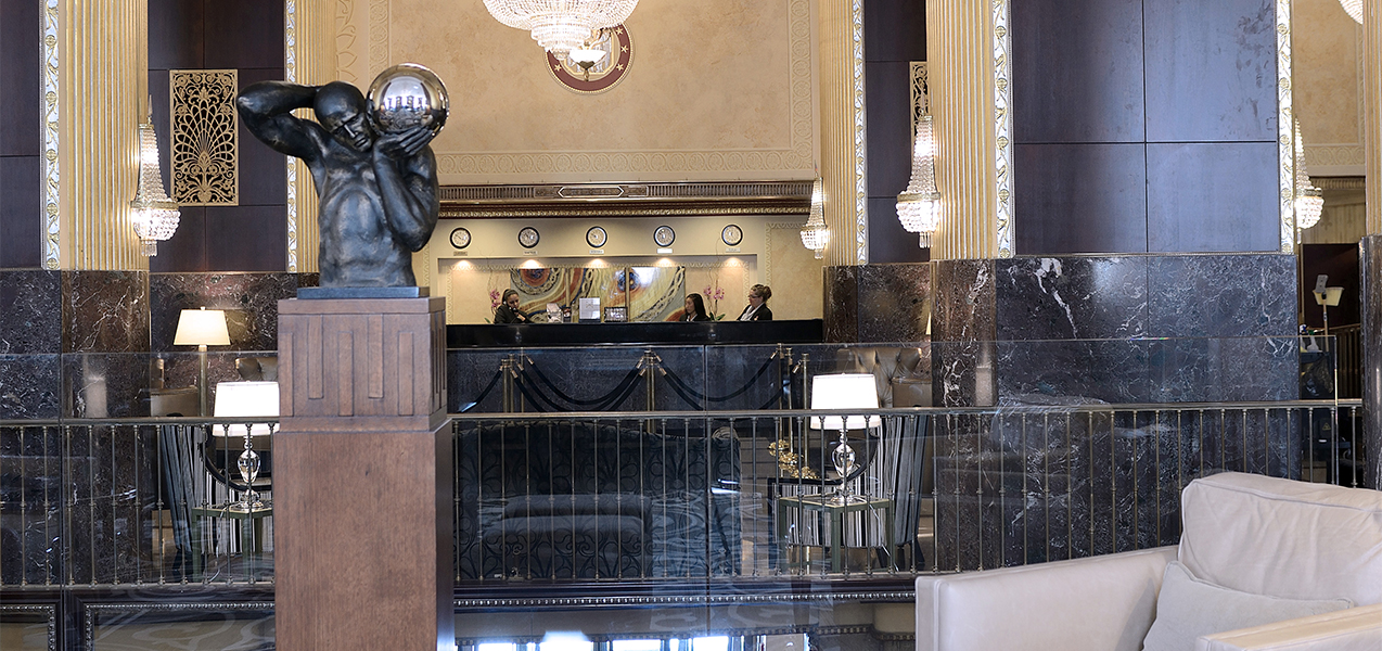 Statues, marble columns and front desk of the Hilton City Center in downtown Milwaukee, Wisconsin.