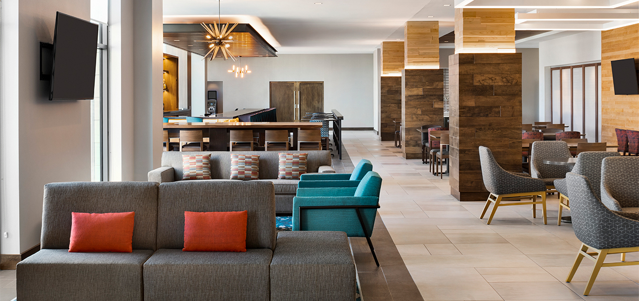 Lobby, chairs and sitting area of the Tri-North Builders remodeled Hilton Garden Inn and Conference Center in Brookfield, WI.