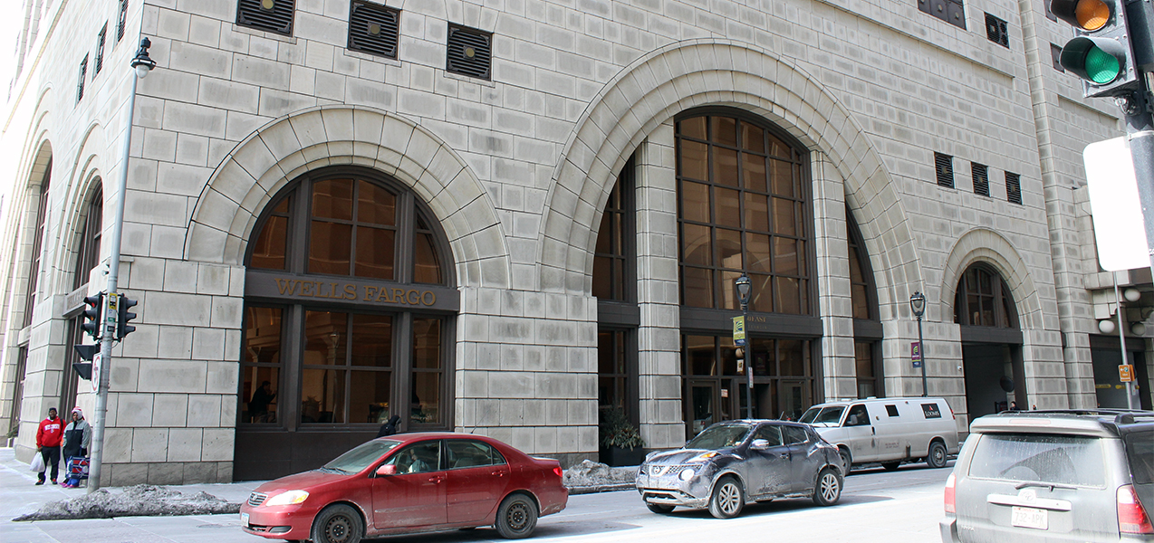 Full front of the Marcus Corporation HQ building with cars in front which is a Tri-North Builders project.