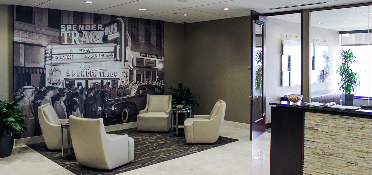 Receptionist desk and waiting area in lobby of new Marcus Corp HQ offices built by Tri-North Builders in Milwaukee, WI.