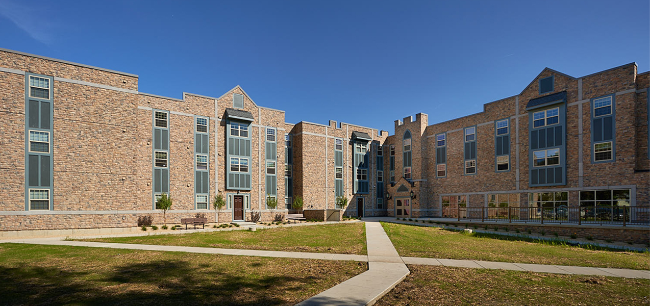 Courtyard and building showing the Newman Heights housing and apartments built by Tri-North Builders in Madison, WI.