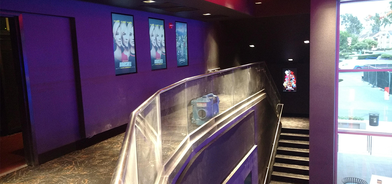 Stairs leading to screening rooms inside the Regal Cinema movie theater which is a Tri-North Builders project.