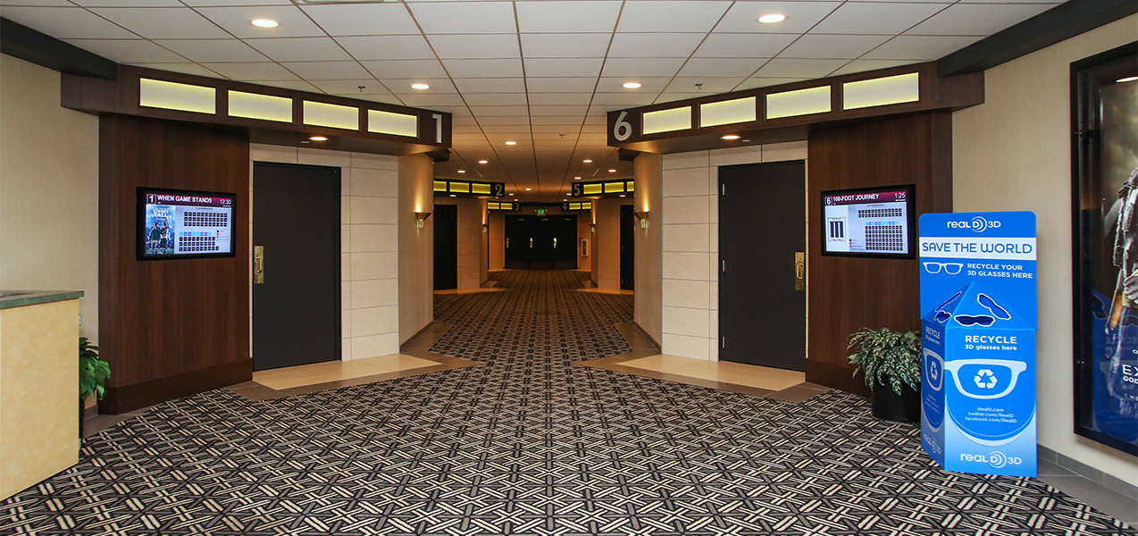 Tri-North Builders Rosemont theater showing the hallway and doors to the screening rooms.