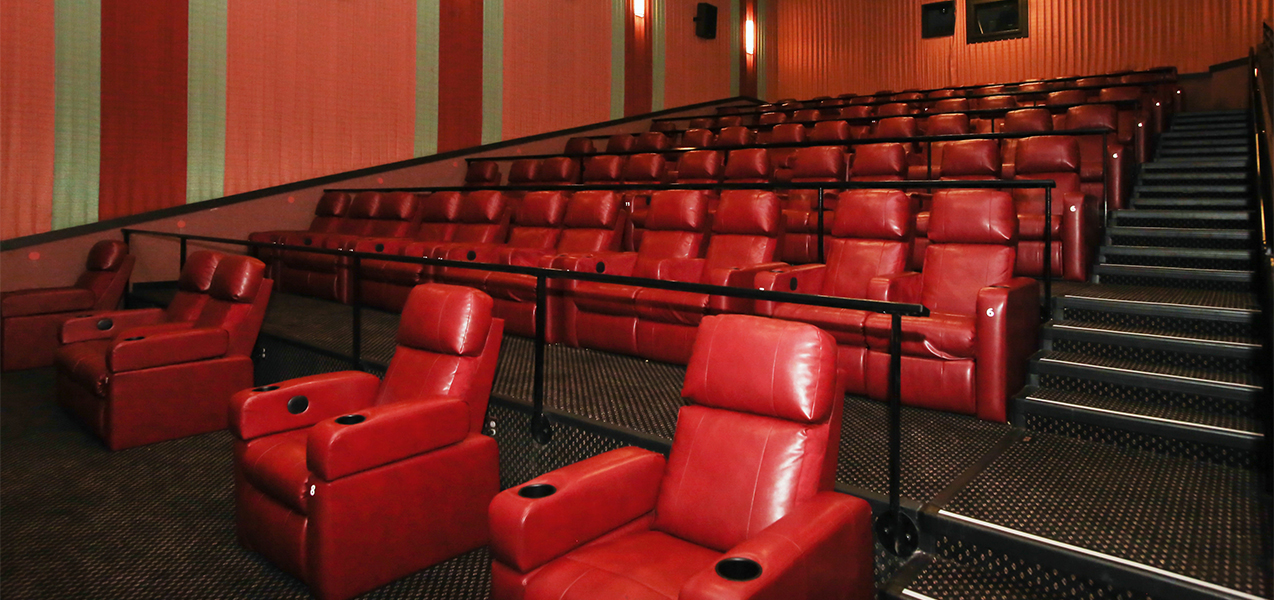 Stadium seating inside screening room at the Rosemont movie theater in Illinois remodeled by Tri-North.