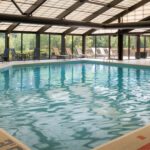Remodeled indoor pool and pool deck area at the Sheraton Madison Hotel a Tri-North Builders project.