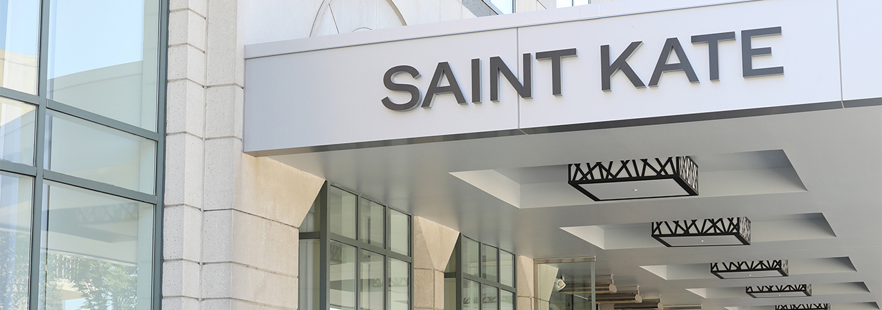 Saint Kate hotel in Milwakee front entrance sign and door as remodeled by Tri-North Builders
