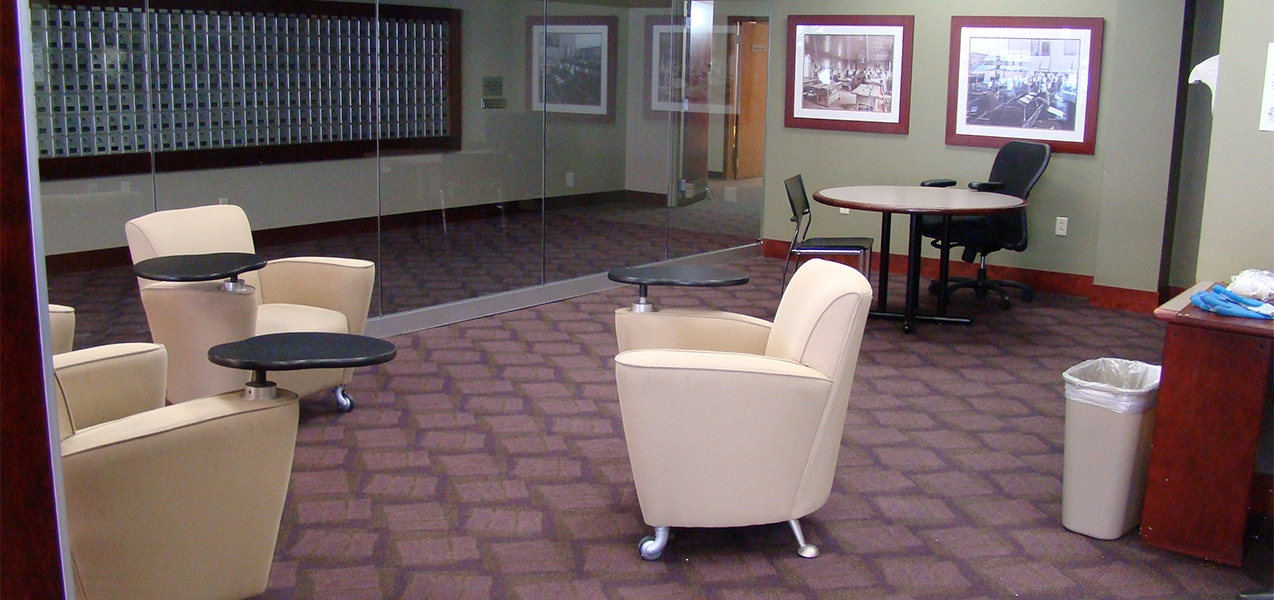 Meeting room with chairs and desks inside The Towers apartment building in Madison, WI.