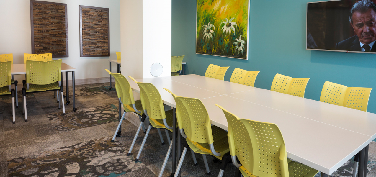 Conference room remodeled by Tri-North Builders inside the Treysta on the Water Apartments in Monona, WI.