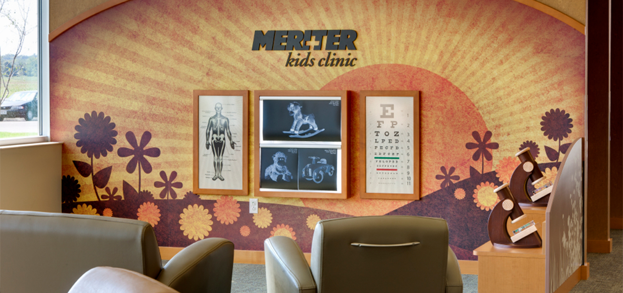 Sign and chairs for the Meriter Kids Clinic inside the Unity Point Meriter DeForest Clinic by Tri-North Builders