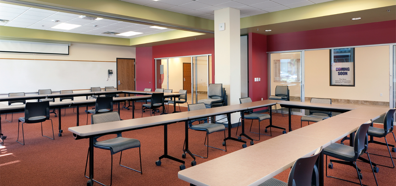 Madison, Wisconsin, Urban League building construction project classroom with tables, chairs and whiteboards.