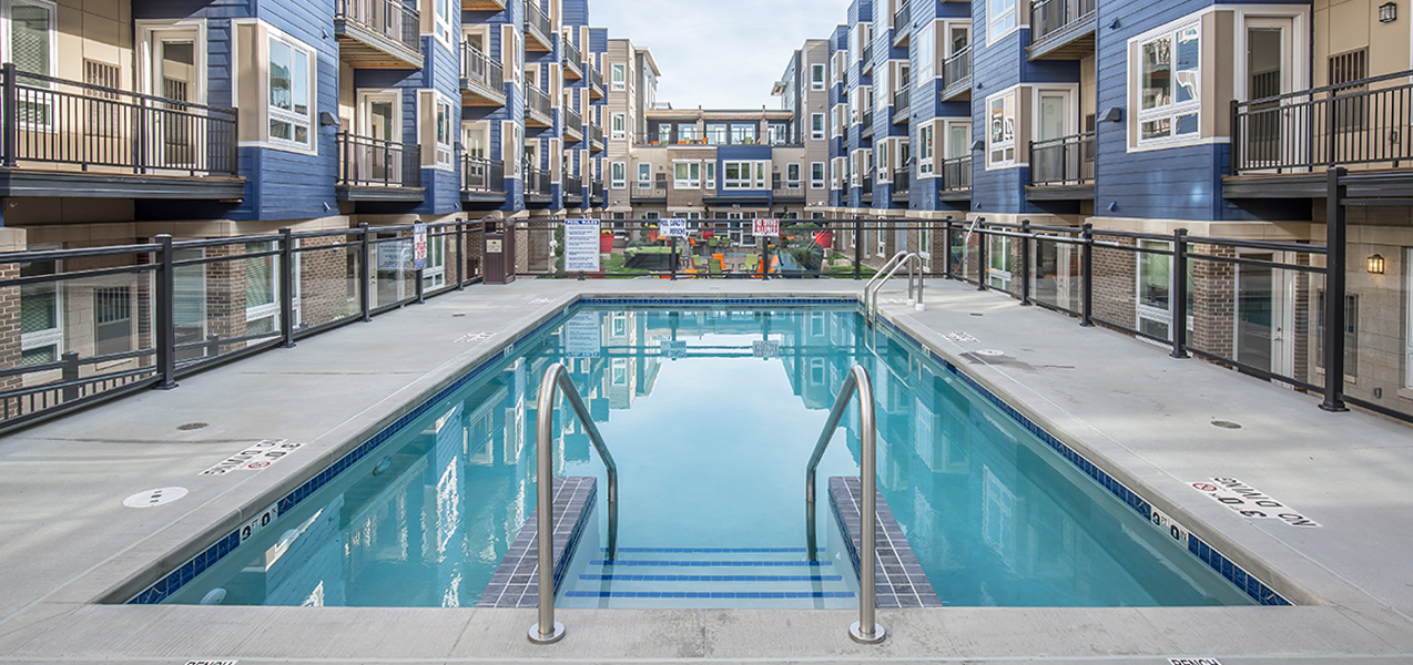 Outdoor pool and courtyard at the newly Tri-North Builders remodeled Veritas Village in Madison.