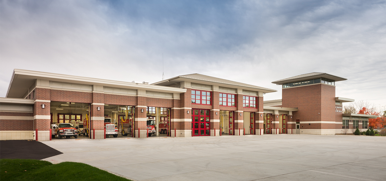 Tri-North Builder's Verona Fire Department project image of fire trucks and garage doors with driveway.