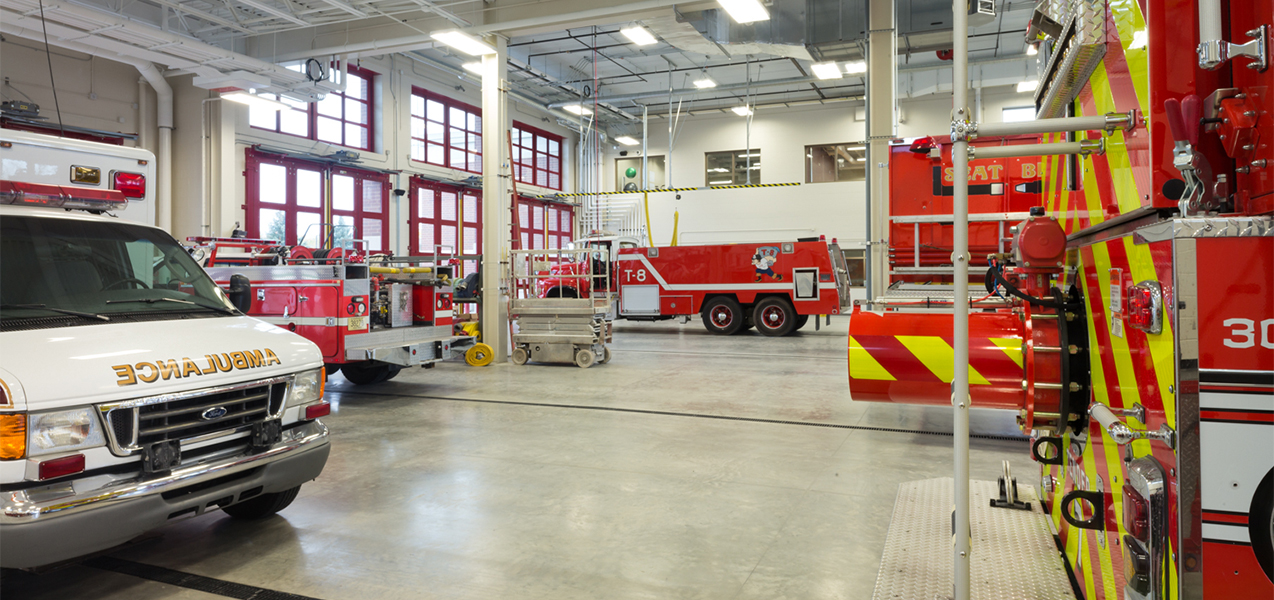 Interior of garage with fire trucks and ambulance at the Verona, WI, fire department building.