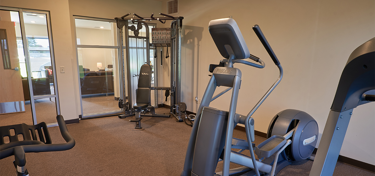 Fitness center and fitness equipment at the Vue Campus Student Living in Fond du Lac, WI, remodeled by Tri-North Builders.